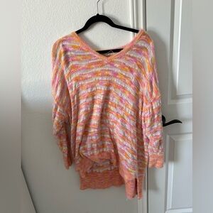 Large free people neon sweater.